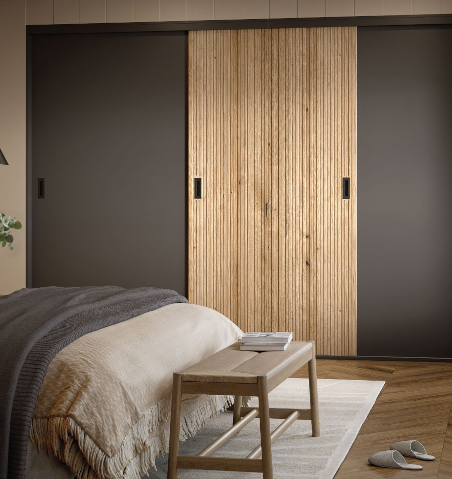 A bedroom Anthracite Aspects and Coast Evoak Oak Cordoba Glide Frameless doors